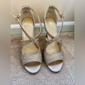 Beautiful, Betsey Johnson, sparkly sandals with turquoise bottoms. Size 7.5.